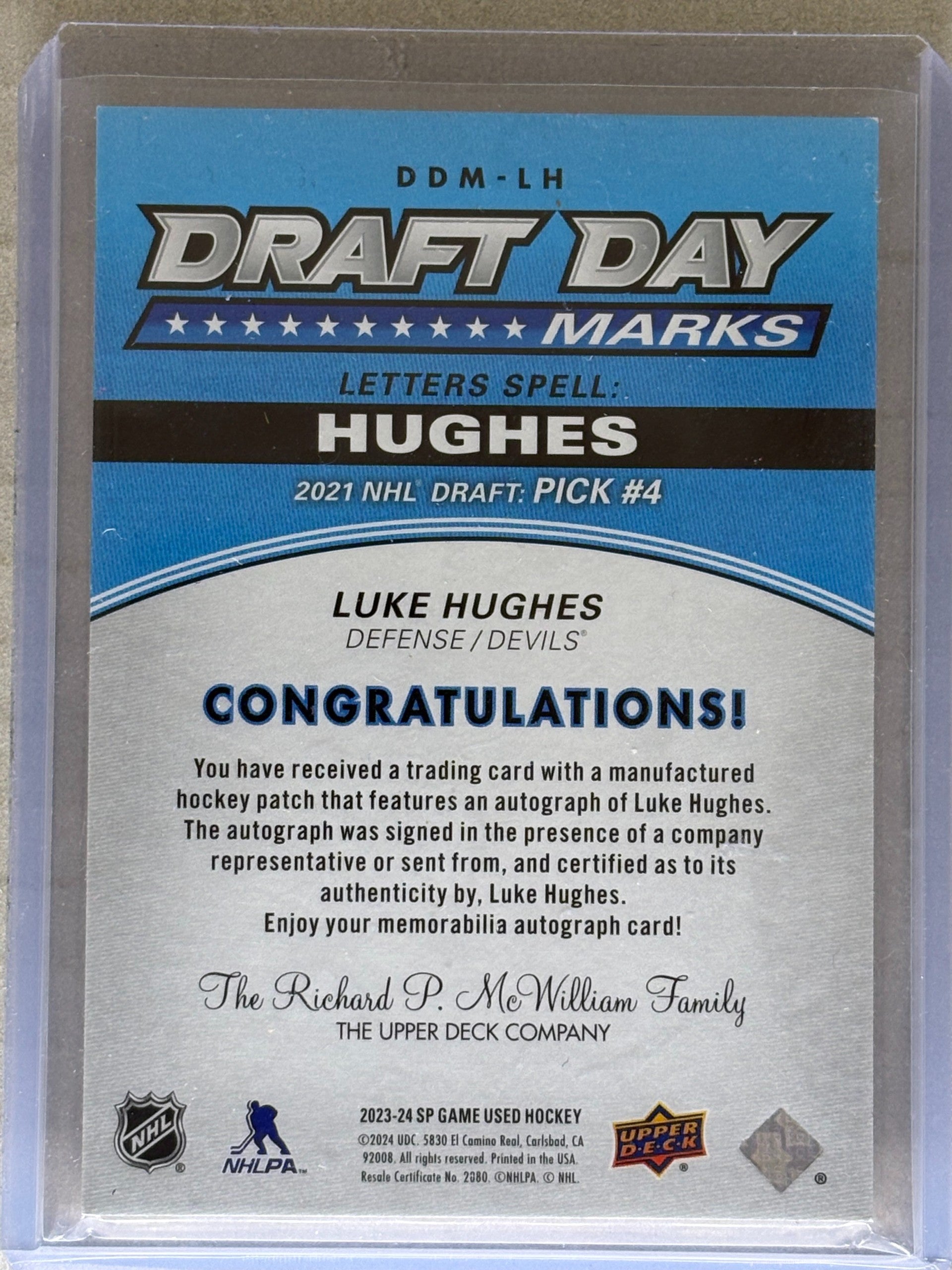 2023-24 Upper Deck SP Game Used Luke Hughes Draft Day Marks "S" 07/35