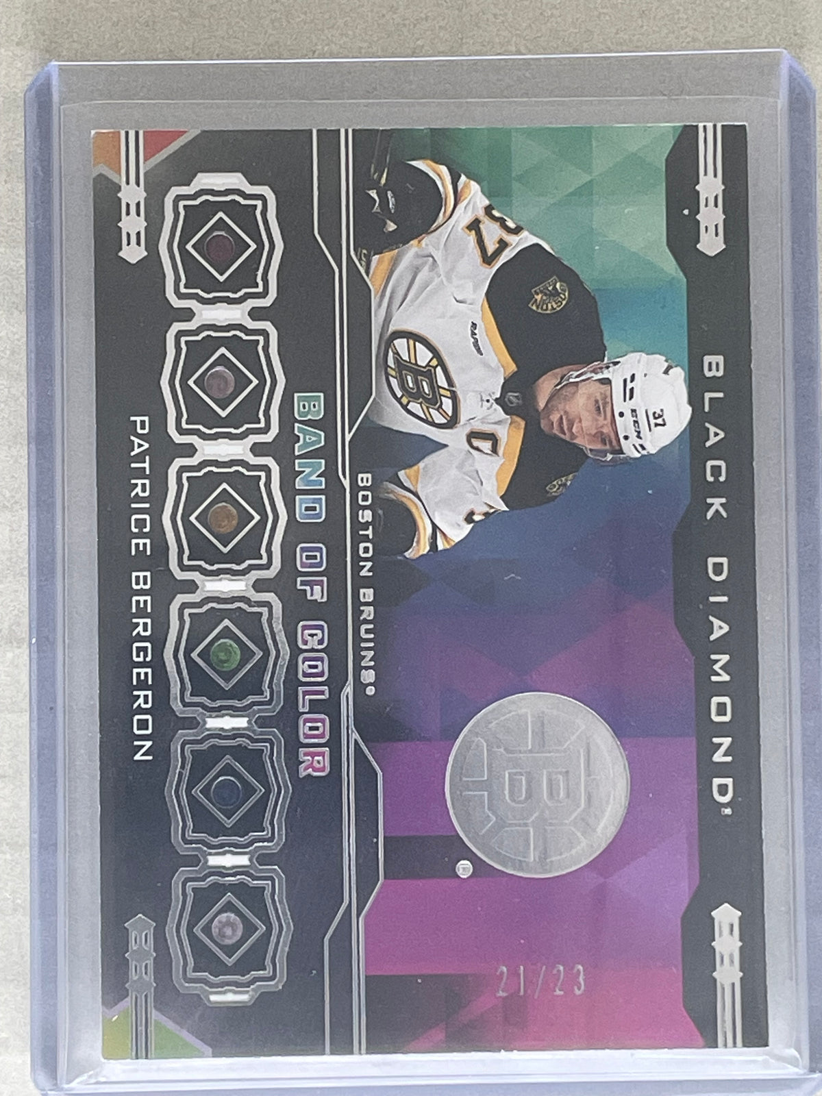 2023-24 Upper Deck Black Diamond Patrice Bergeron Band Of Color 21/23
