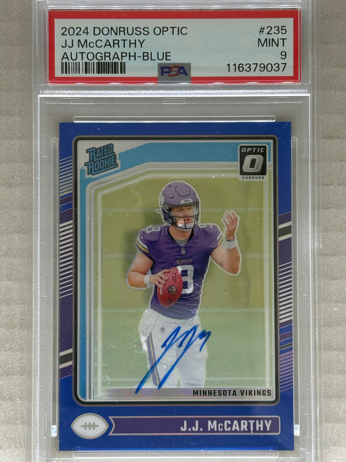 2024 Donruss Optic Rated Rookie Autograph Blue /99 J.J. McCarthy PSA 9